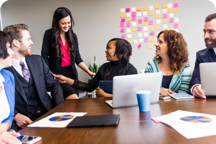 A team meeting where everyone is working well together.