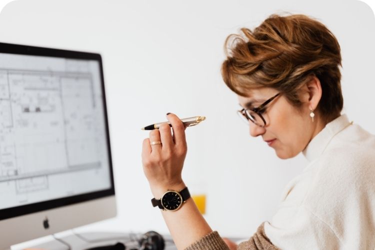 A businesswoman working at her desk.