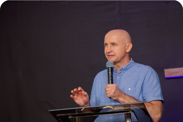 A pastor giving a sermon.