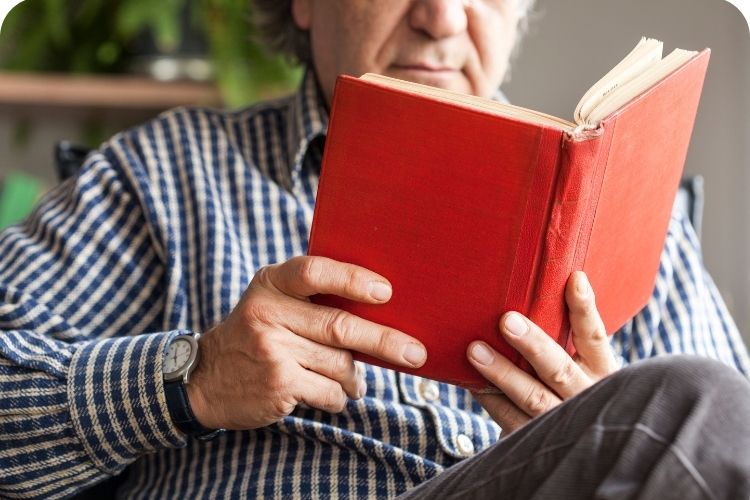 A man reading a book.
