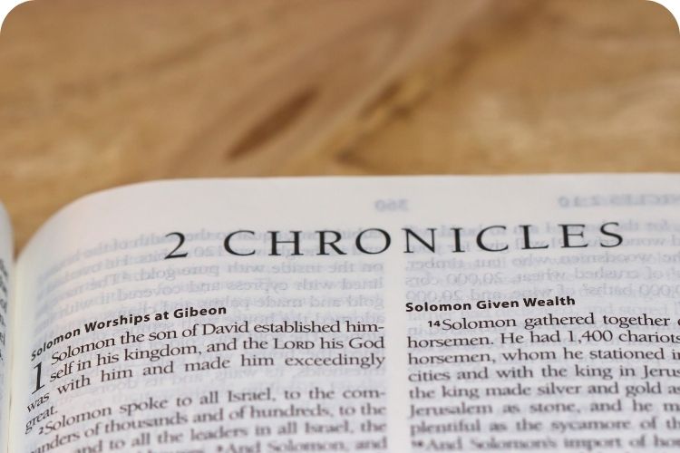 A Bible opened to 2 Chronicles.