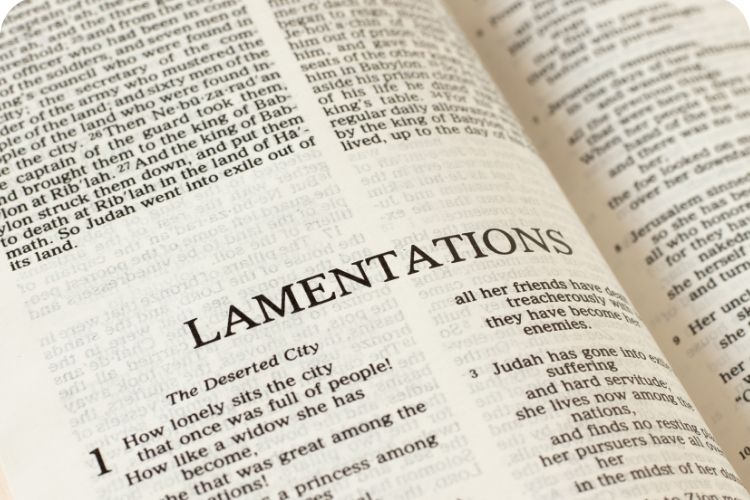 A Bible opened to Lamentations.