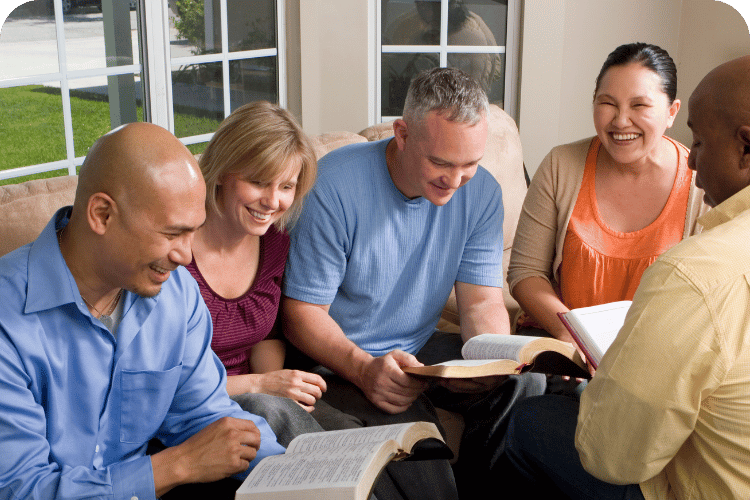A group of people having a Bible study.